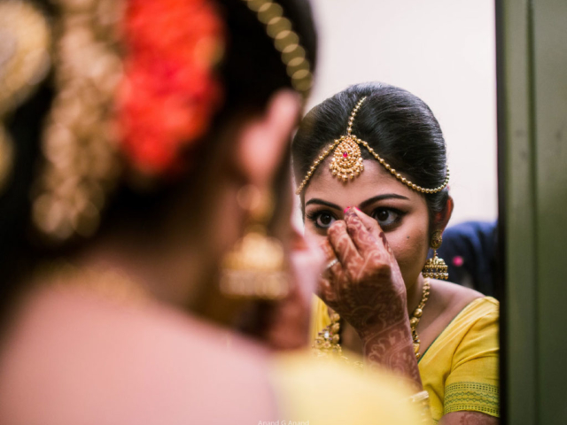 A candid click of bride getting ready for her wedding