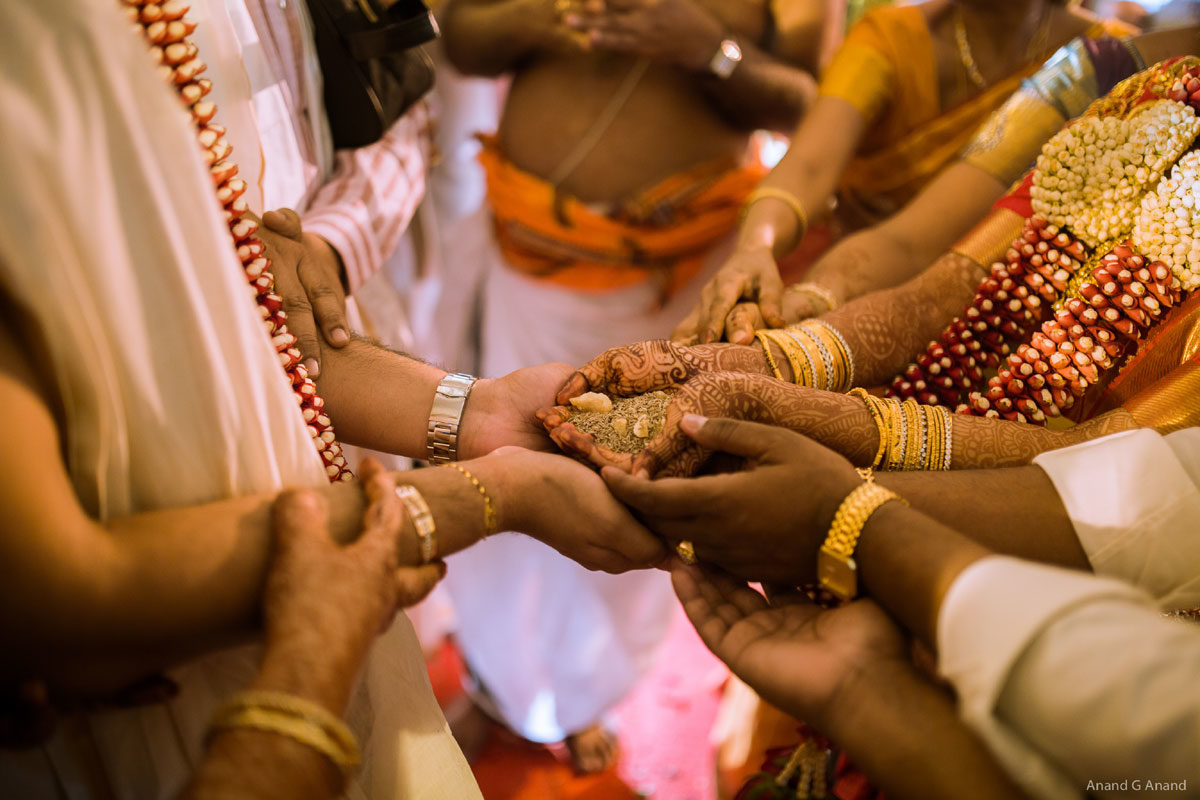 Groom holding bride hands during an Indian brahmin wedding Kanyadaan ritual